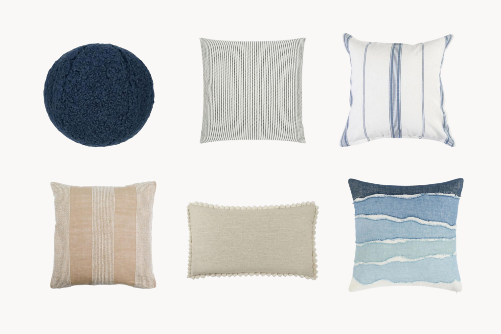 posttitle | sitetitle Six decorative pillows a round navy textured pillow a square striped pillow a white pillow with blue vertical stripes a beige striped pillow a beige rectangular pillow with pompom edge and a blue wave patterned pillow